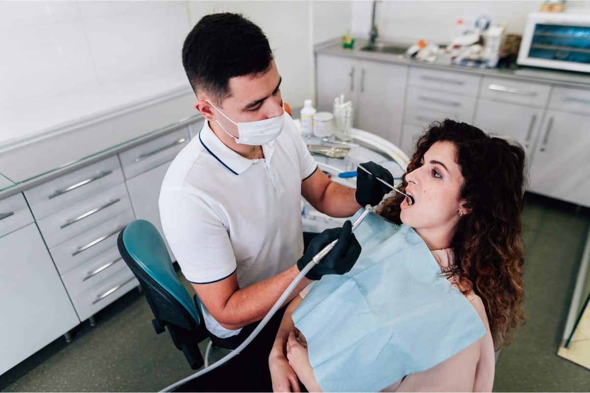 A patient visiting a dental office in Rio Rancho for a check-up A patient visiting a dental office for a check-up