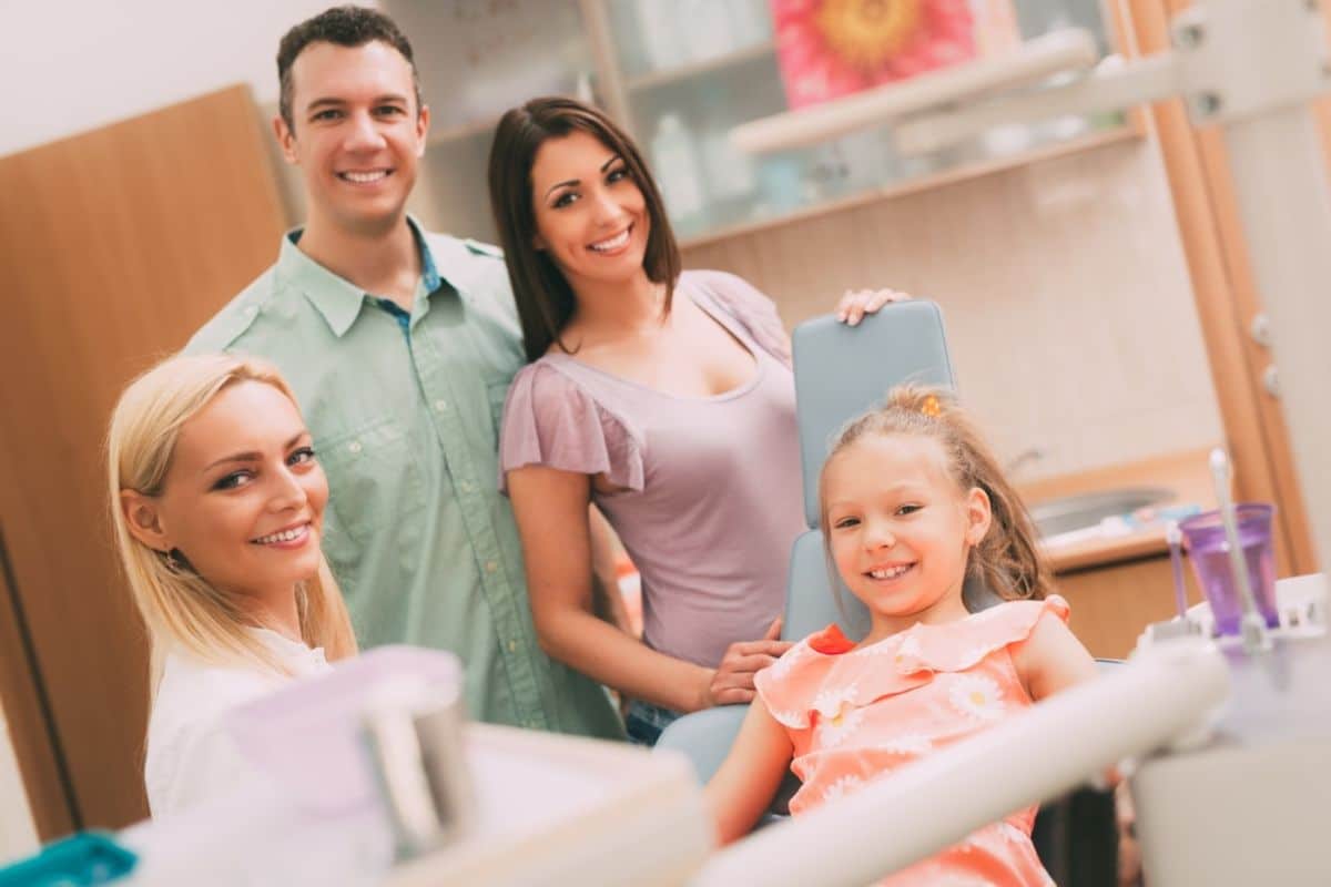 A friendly family visiting a dentist