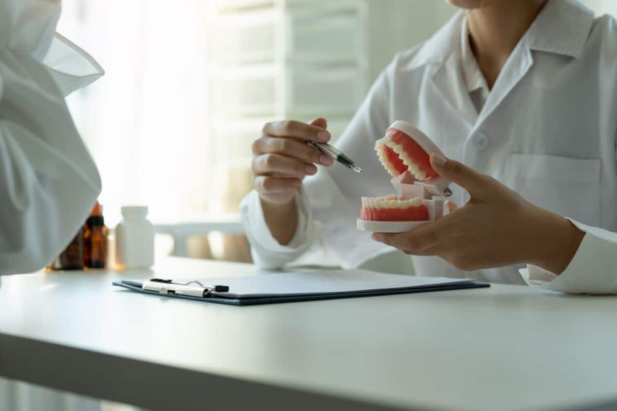 A patient is consulting with a dentist about dental implants A patient is consulting with a dentist about dental implants in Rio Rancho.