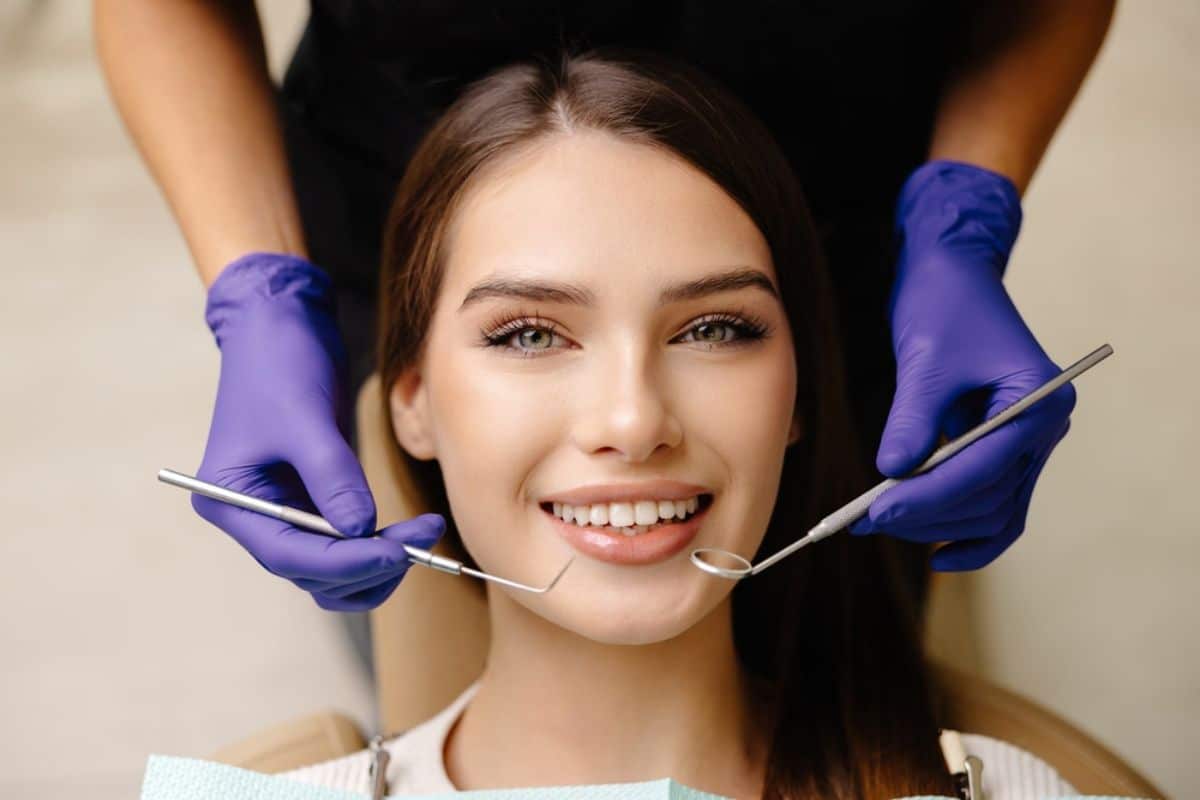 Smiling patient receiving dental care Smiling patient receiving dental care from Rio Rancho Dentist.