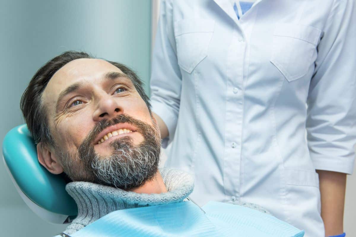 Dental patient preparing for a dental implant procedure Dental patient preparing for a dental implant procedure for improved oral health.