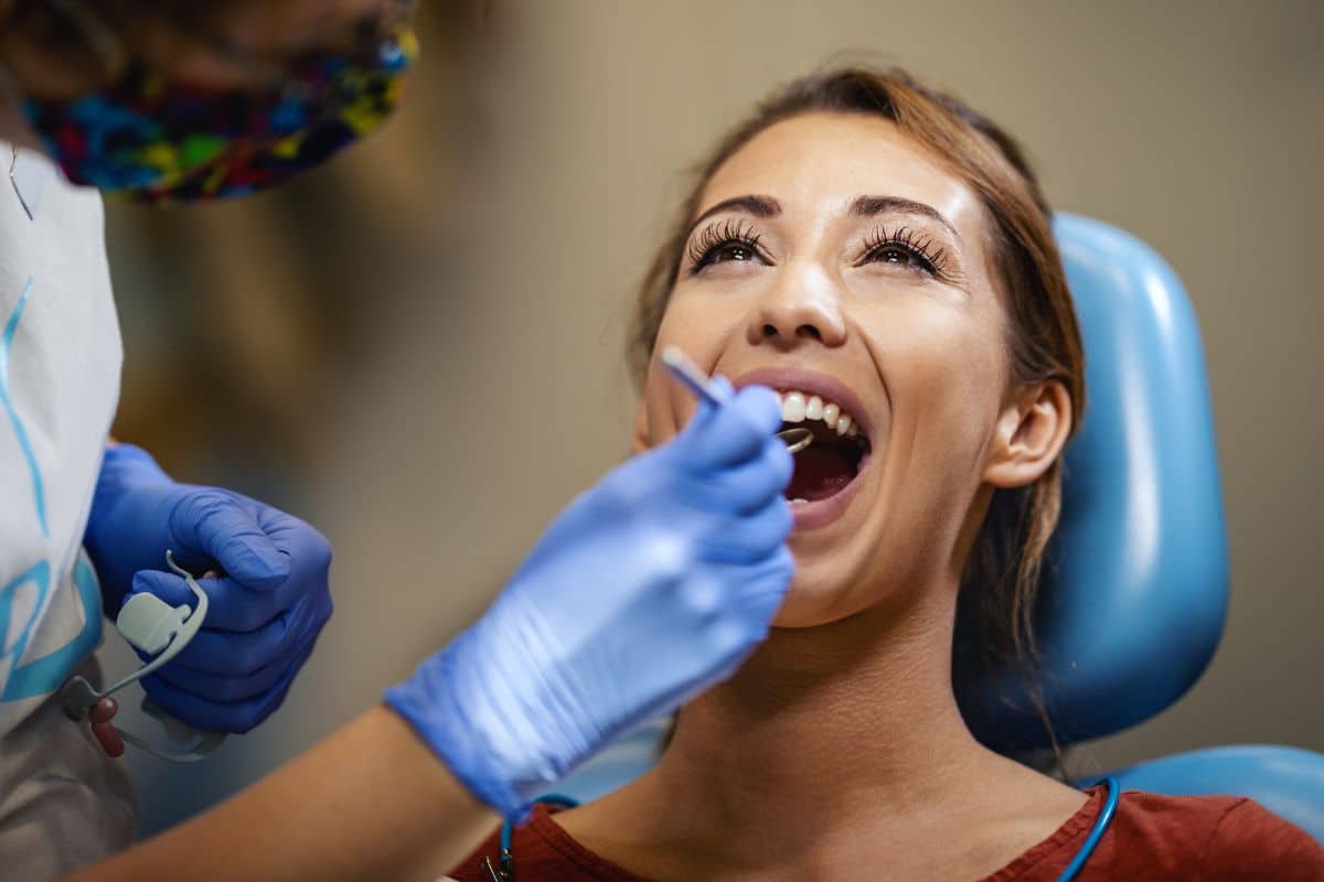 Cosmetic Dental Checkup Patient receiving cosmetic dental treatment.